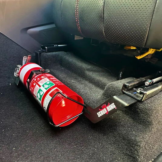 Scrub King matte black stainless steel fire extinguisher bracket mounted on BYD Shark 2024 passenger seat rail