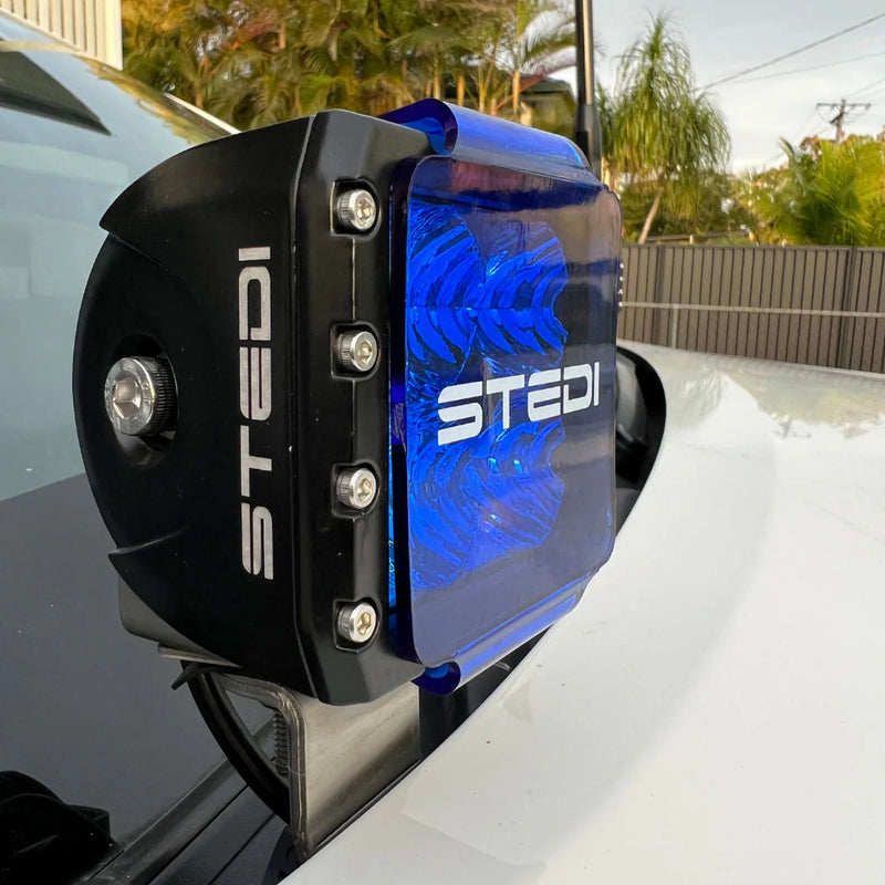 Load image into Gallery viewer, Scrub King ditch light mount fitted to driver-side bonnet hinge on Toyota HiLux N80
