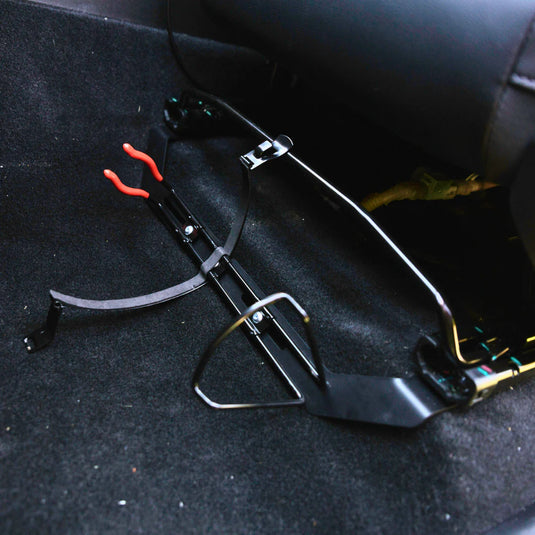 Scrub King matte black fire extinguisher bracket mounted on GWM Cannon passenger seat rail
