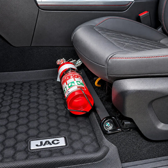 Scrub King JAC T9 fire extinguisher bracket mounted to passenger seat rail