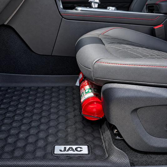 Close-up of JAC T9 fire extinguisher bracket seat bolt mounting – no drilling