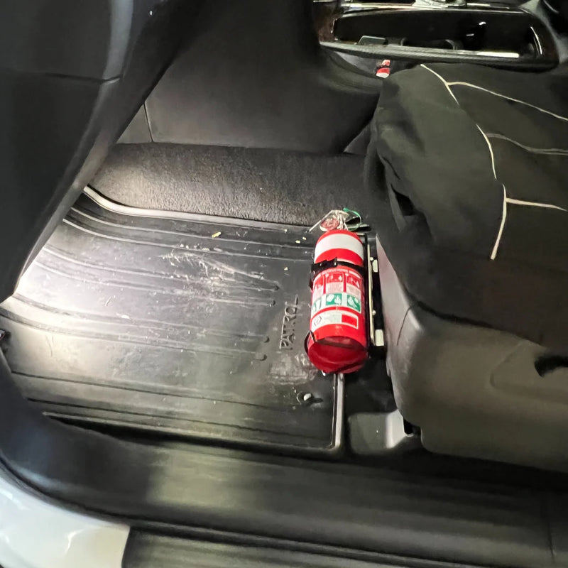 Load image into Gallery viewer, Heavy-duty 3mm steel fire extinguisher bracket for 2017–2023 Nissan Y62 Patrol. No drilling required. Australian-made. Essential 4WD safety gear. Shop now.
